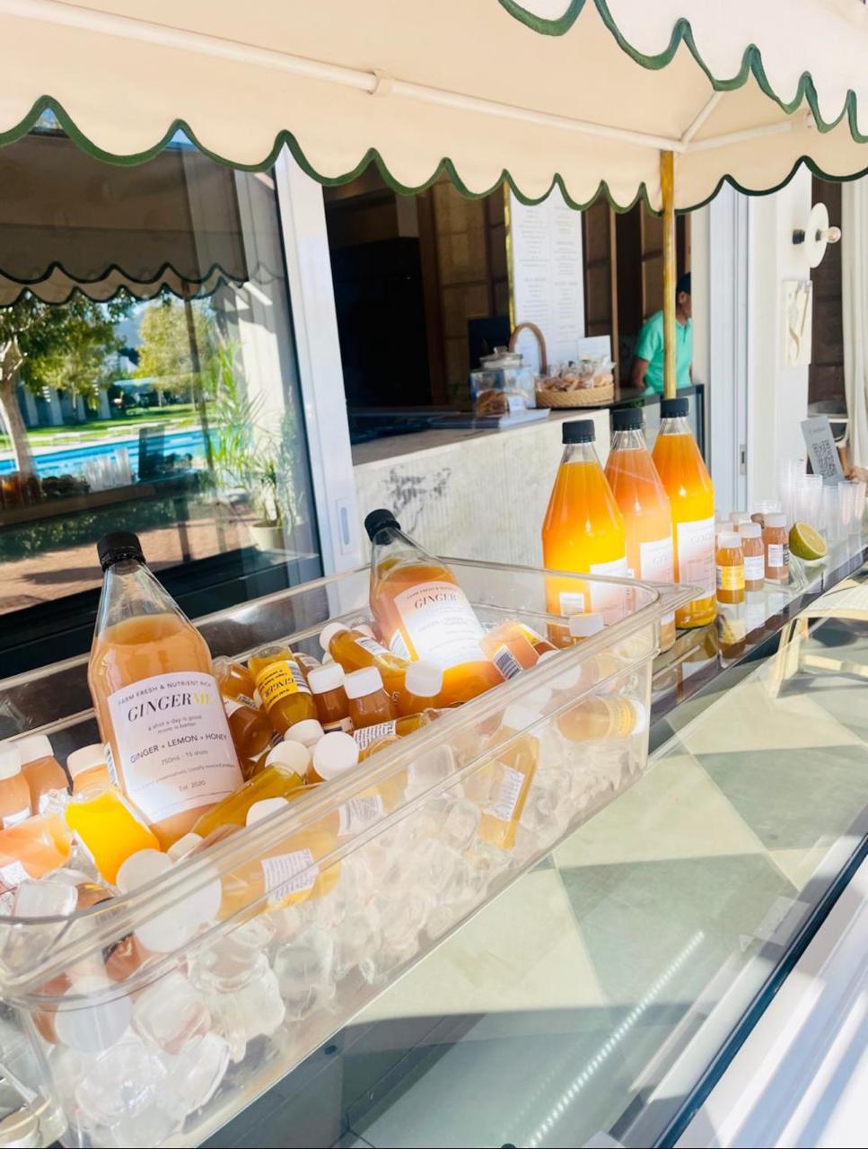 Beverage display with bottles and glasses inside a food truck